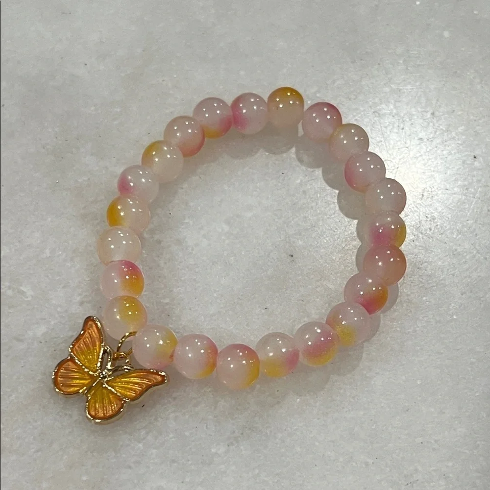 Elegant Pink and Yellow Beaded Bracelet with Butterfly Charm